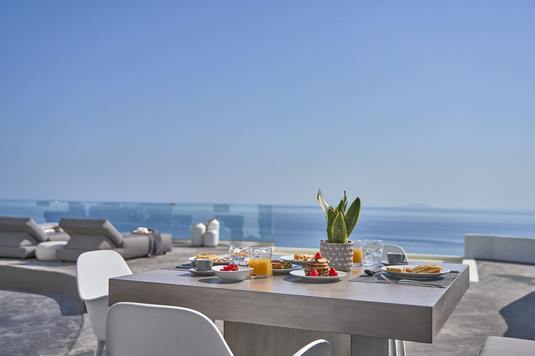 Topos Exclusive Villas & Suites | Santorini, Mykonos, Athens
